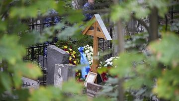 Flowers are seen on the grave of Wagner Group&#x27;s chief Yevgeny Prigozhin after a funeral at the Porokhovskoye cemetery in St. Petersburg, Russia, Tuesday, Aug. 29, 2023.  