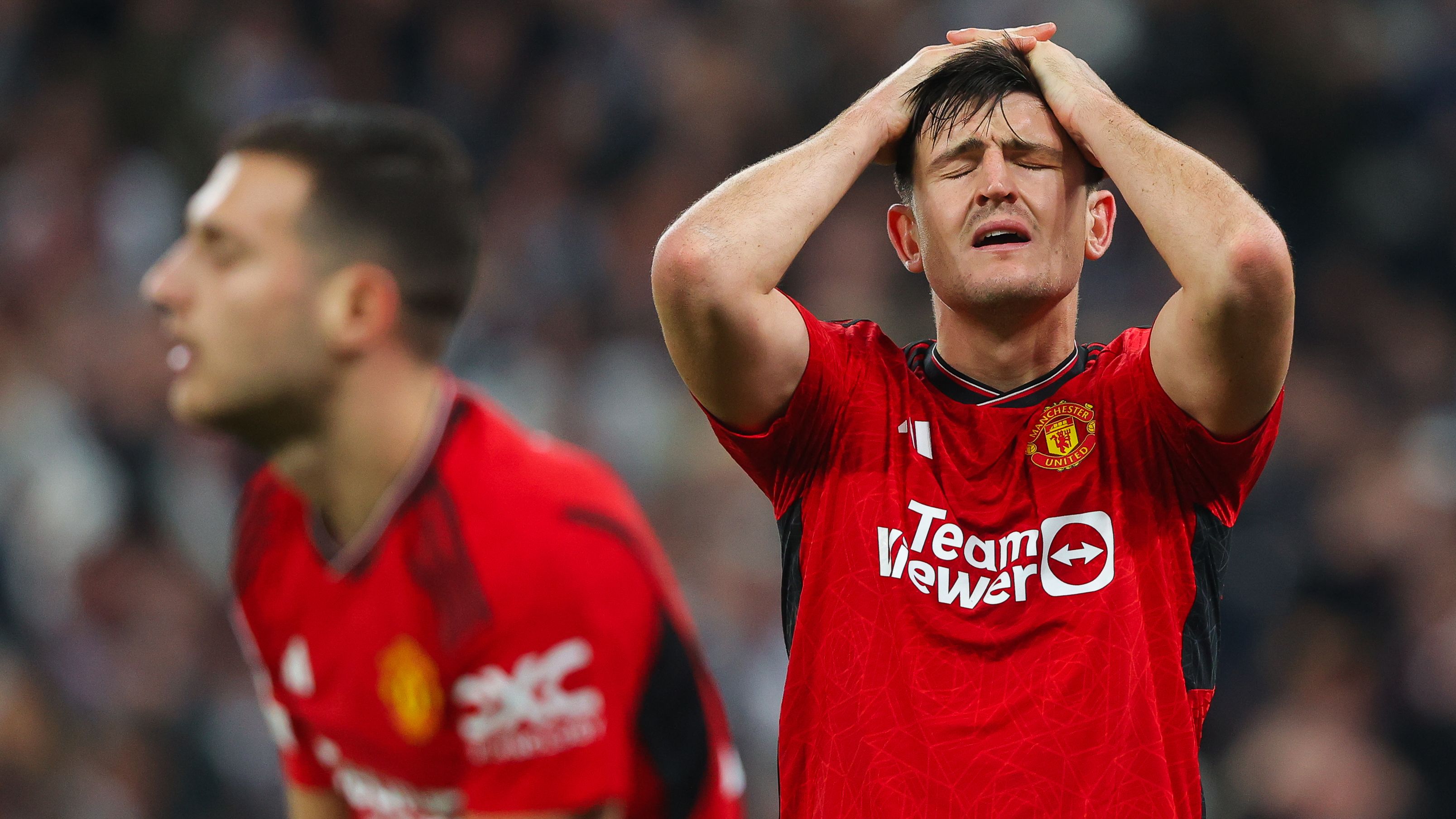 Harry Maguire of Manchester United looks dejected after FC Copenhagen score a fourth goal.