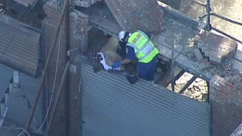 The man, aged in his 40s, suffered back and chest injuries. (9NEWS)