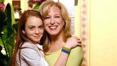 Lindsay Lohan (as Rose) and Bette Midler (as Bette) are seen here on "Bette," in April 2000. Middler recently spoke about her failed 2000 CBS sitcom on David Duchovny's podcast.