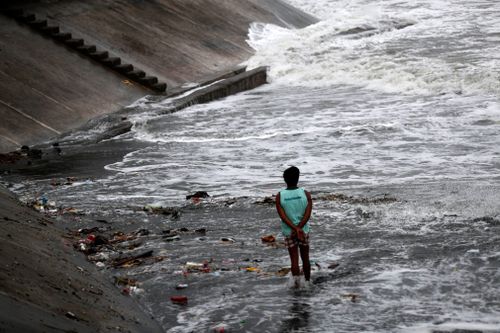 Storm warnings have been raised in almost all the provinces across the main northern island of Luzon, including the capital, Manila, restricting sea and air travel.