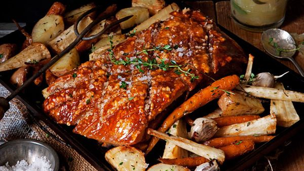 Pork belly with slow-roasted winter vegetables and apple and sage sauce