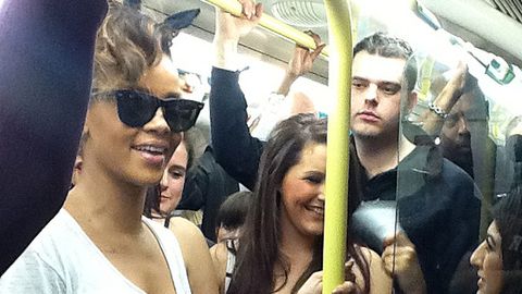 Rihanna catches the train with fans to her own concert