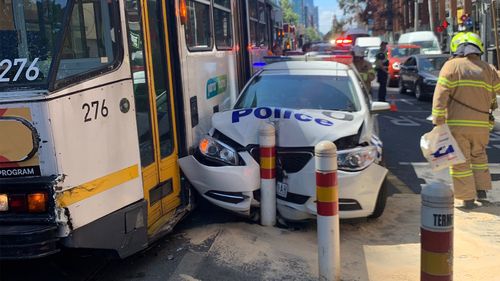 Police car destroyed after colliding with Melbourne tram  