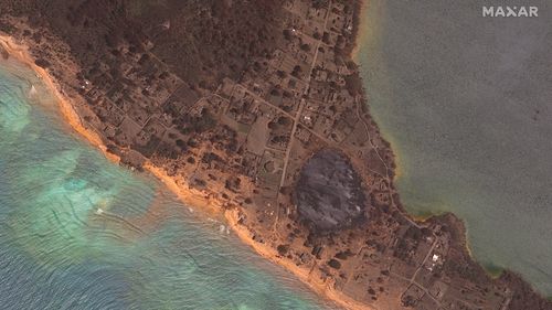 This satellite image provided by Maxar Technologies shows an overview of the damage on Nomuka in the Tonga island group on January 20 after the natural disaster. 