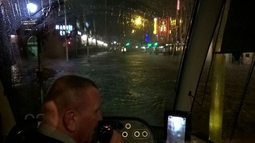 Twitter user @ronnie1924 posted this photo of a Sydney tram stuck in Haymarket due to flooding.
