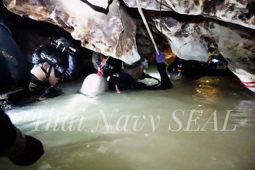 Earlier attempts to pump water from out of the cave to free up space for the boys to escape have been marred by heavy rainfall that has resulted in flooding. Picture; Thai Navy SEAL.