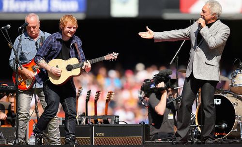 Did Tom Jones swear at former AFL star Campbell Brown during a grand final interview?