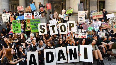 Students protest on the steps of South Australian Parliament in Adelaide.