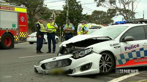 It's been confirmed a police car that was chasing a driver who was using their mobile phone, was travelling at 124 kilometres an hour in a 70 kph zone.

