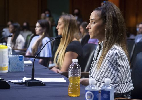 US Olympic gymnasts Simone Biles, McKayla Maroney,  Maggie Nichols, and Aly Raisman, testify during a Senate Judiciary hearing about the Inspector General's report on the FBI handling of the Larry Nassar investigation of sexual abuse of Olympic gymnasts, on Capitol Hill, September 15, 2021, in Washington, DC.