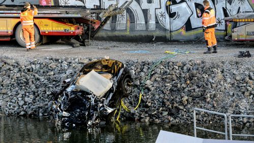 The vehicle they were travelling in plunged more than 25m off a bridge into a canal. (AAP)