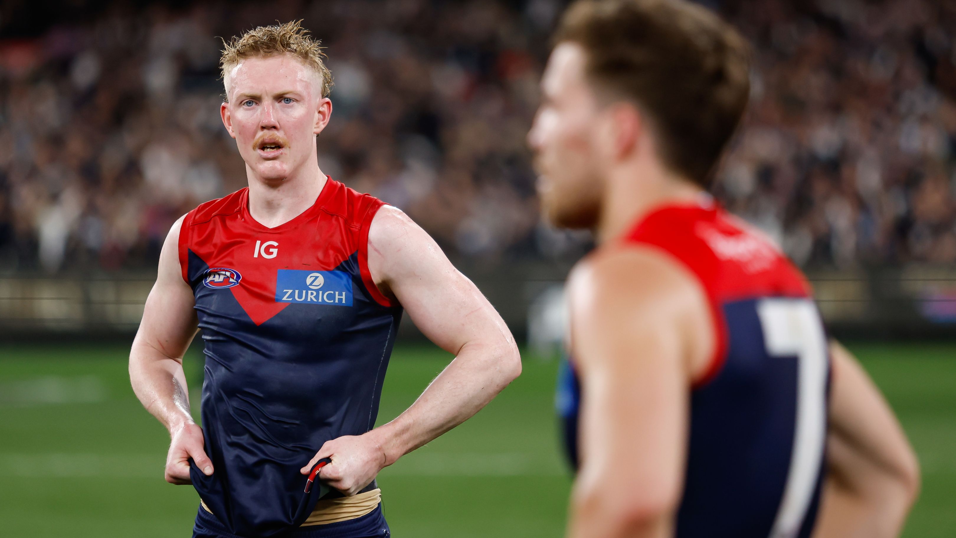 Clayton Oliver of the Demons looks dejected after a loss  during the 2023 AFL First Semi Final match between the Melbourne Demons and the Carlton Blues at Melbourne Cricket Ground on September 15, 2023 in Melbourne, Australia. (Photo by Dylan Burns/AFL Photos via Getty Images)