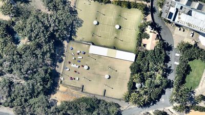 <p>BEFORE: Tennis courts on Hamilton Island, where wind gusts up to 263km/h were recorded during the cyclone.&nbsp;</p>
<p>(Nearmap.com.au)</p>