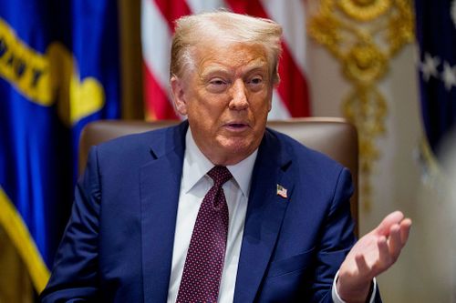 US President Donald Trump during a cabinet meeting at the White House in Washington, DC, US, on Tuesday, Aug. 26, 2025. Trump said he was prepared for a legal fight with Federal Reserve Governor Lisa Cook after he moved to oust her from her post following allegations that she falsified mortgage documents. Photographer: Aaron Schwartz/CNP/Bloomberg