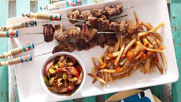Moroccan beef kebabs with harissa chips and grilled vegetable salad by Andy Harris. Image: Gourmet Traveller