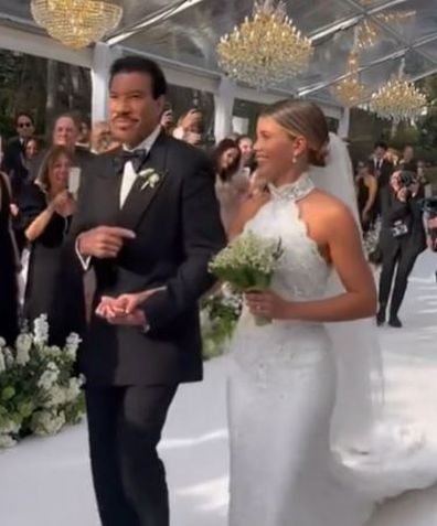 Lionel Richie walking Sofia down the aisle