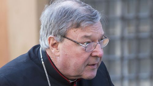 Cardinal George Pell denies bribery allegations