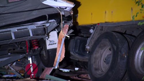 The garbage truck remained at the scene overnight. (9NEWS)