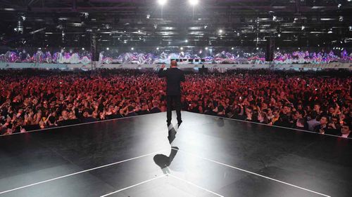 Vladimir Putin addresses an election rally in Moscow. (AAP)