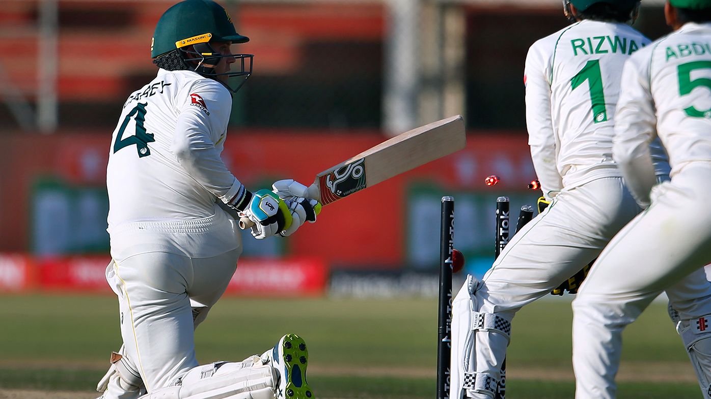 Australia&#x27;s Alex Carey is bowled by Pakistan&#x27;s Babar Azam during the second day of the second test match between Pakistan and Australia at the National Stadium in Karachi.