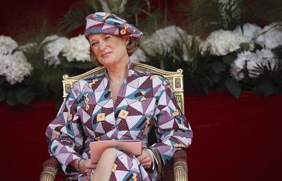 Belgium's Princess Delphine watches the National Day Parade from the podium in front of the Royal Palace in Brussels, Wednesday, July 21, 2021. Belgium celebrates its National Day on Wednesday in a scaled down version due to coronavirus, COVID-19 measures. (AP Photo/Olivier Matthys)