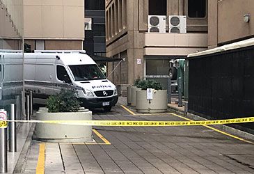 The bomb squad was called to which CBD when explosives were allegedly found?