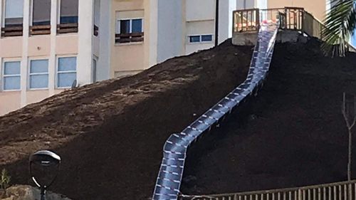 A slide built in the southern Spanish town of Estepona has been closed after reports of users being injured while riding down it. 