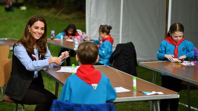 Duchess of Cambridge talks with members of the Beavers as she visits a Scout Group in Northolt, northwest London where she joined Cub and Beaver Scouts in outdoor activities on September 29, 2020 in London, England