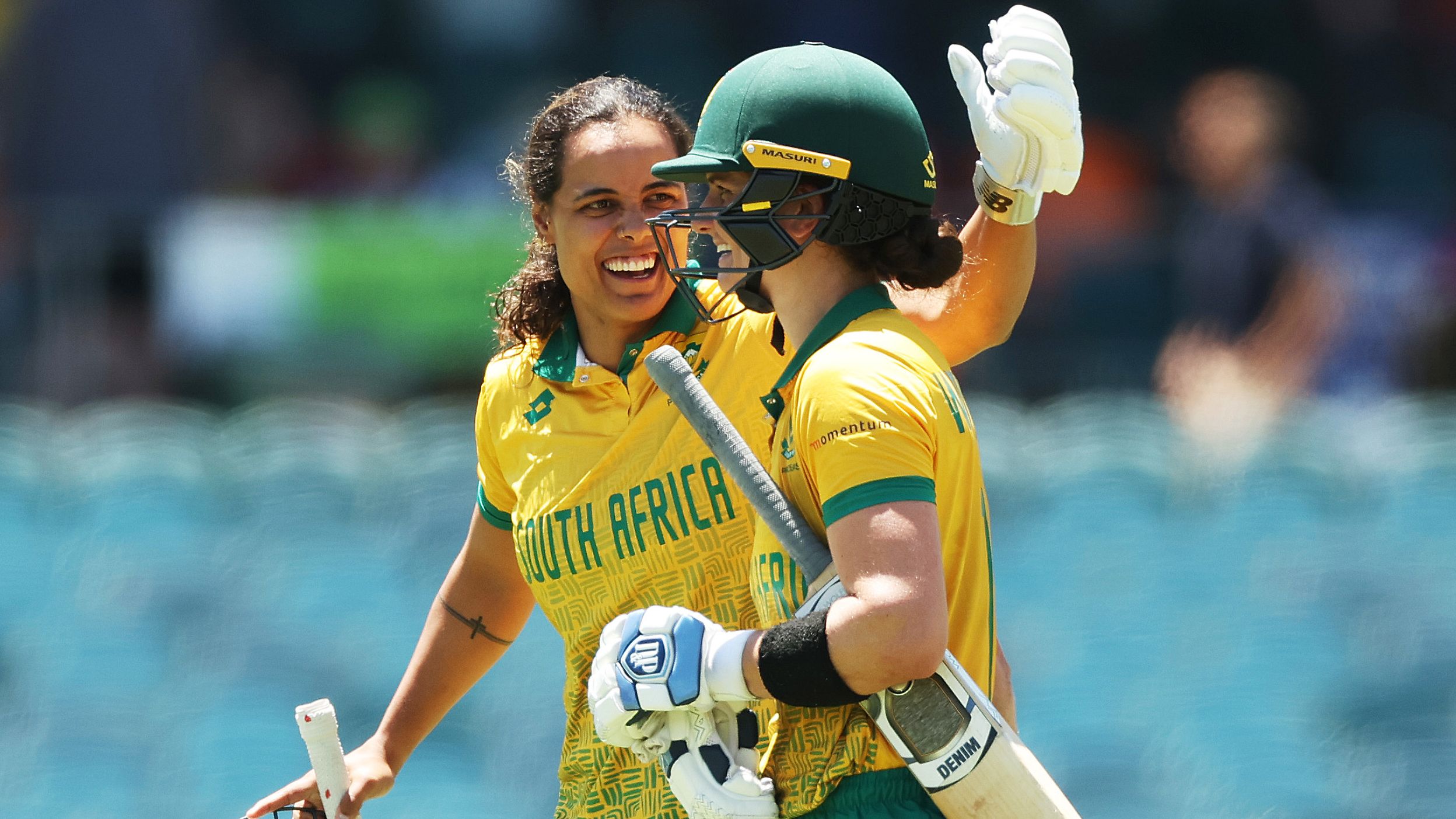 Chloe Tryon of and  Laura Wolvaardt of South Africa celebrate victory during game two of the Women&#x27;s T20 International series between Australia and South Africa at Manuka Oval on January 28, 2024 in Canberra, Australia. (Photo by Mark Metcalfe/Getty Images)