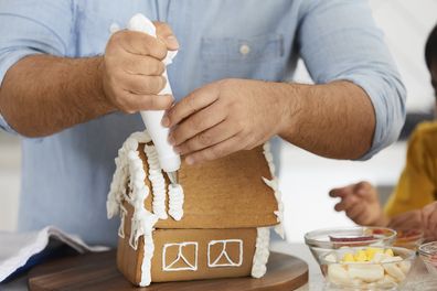 Adam Liaw making a gingerbread house