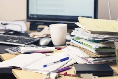 <strong>Desk clutter<br />
Emotional issue:
Procrastination</strong>
