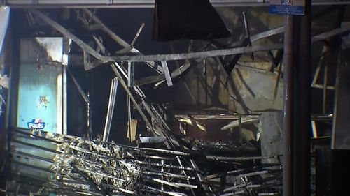 News Brisbane businesses shops destroyed fire emergency Coorparoo Queensland Australia