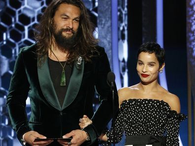 Jason Momoa and Zoe Kravitz speak onstage during the 77th Annual Golden Globe Awards at The Beverly Hilton Hotel on January 5, 2020 in Beverly Hills, California. (Photo by Paul Drinkwater/NBCUniversal Media, LLC via Getty Images)