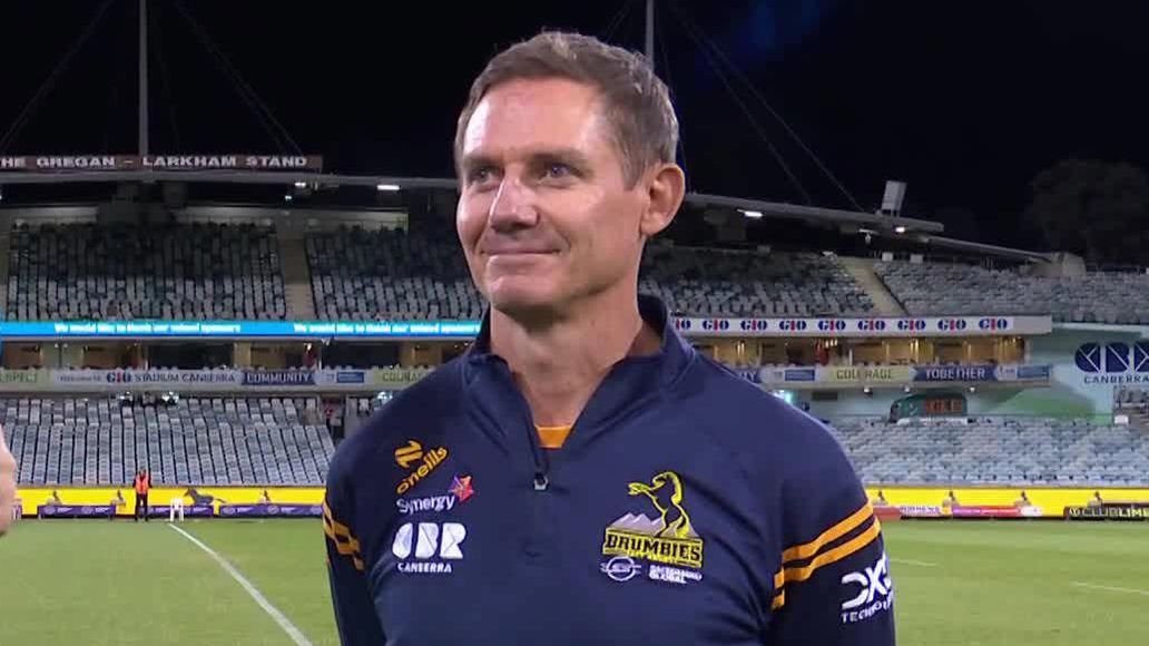 Former Wallabies Justin Harrison (left) and Brumbies head coach Stephen Larkham.