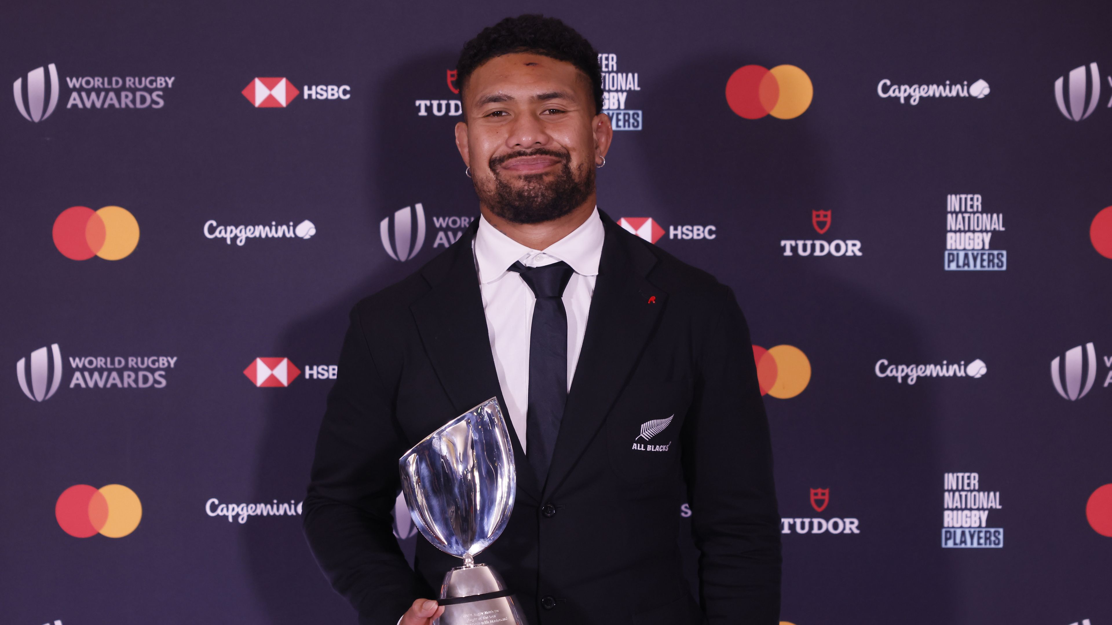 New Zealand&#x27;s Ardie Savea poses with his trophy of Rugby Men&#x27;s 15s Player of the Year during the World Rugby Awards.