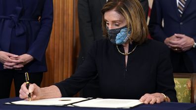 Nancy Pelosi signs article of impeachment 
