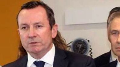 WA Premier Mark McGowan rocks a mullet that would put Bon Jovi to shame.