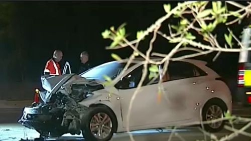 The driver of the white hatchback, a 26-year-old woman, remains in a critical condition. (9NEWS)