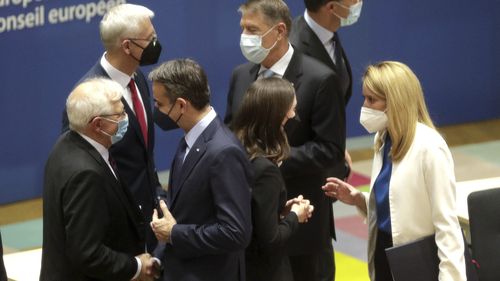 (L-R) European Union foreign policy chief Josep Borrell, Latvia's Prime Minister Krisjanis Karins, Greek Prime Minister Kyriakos Mitsotakis, Finland's Prime Minister Sanna Marin, Romania's President Klaus Werner Ioannis and Dutch Prime Minister Mark Rutte during a round table meeting at an extraordinary EU summit on Ukraine at the European Council building in Brussels, Thursday, Feb 24, 2022.