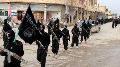 Fighters from the Islamic State group, marching in Raqqa, Syria.