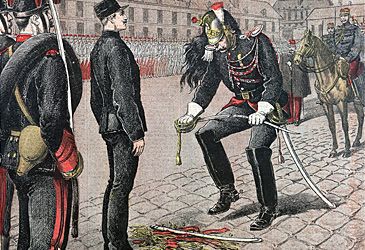 When was French officer Alfred Dreyfus falsely accused of colluding with Germany?