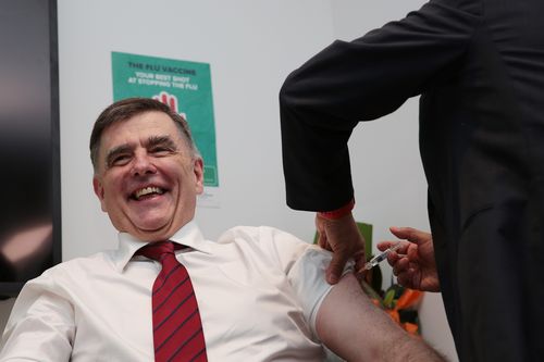 Australia's Chief Medical Officer Professor Brendan Murphy prepares to receive his flu shot during a visit to SIA Medical Centre in Victoria today. (AAP)
