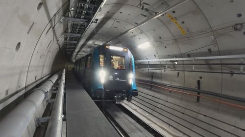 A train has gone under the Sydney Harbour Bridge for the first time as a new railway tunnel is tested.