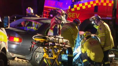 Emergency services worked to free a man from a vehicle involved in a crash in Sydney's west this morning (Supplied).