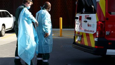  Medical transport workers prepare to enter the Epping Aged Care Home on July 29, 2020 in Melbourne, Australia. 