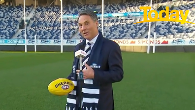 Decked in his team colours, Marles was there to support the Geelong Cats.