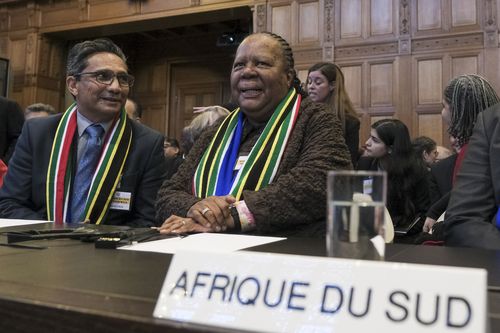 South Africa's Foreign Minister Naledi Pandorthe, centre, attends the session of the International Court of Justice, or World Court, in The Hague, Netherlands, Friday, Jan. 26, 2024. 