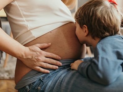Pregnant mum and older child