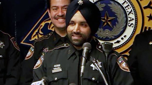 Harris County Deputy Sandeep Dhaliwal was shot "from behind... at least a couple of times" while conducting a traffic stop, officials said.